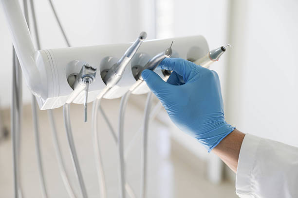 Professional Tooth Extraction technician working in Andover, KS
